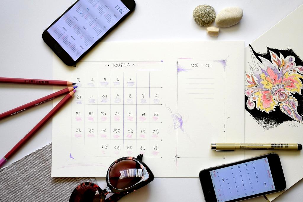 Traveler exploring different features of BRANDNAME on laptop and smartphone